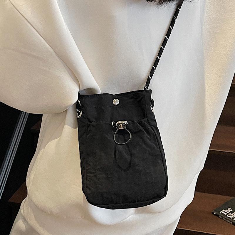 Summer new literary single shoulder messenger bag drawstring small bag niche fashion lightweight mobile phone nylon bag women