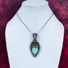 Green Carved Bone Face Pendant Copper Wire Wrapped Rainbow Moonstone Jewelry