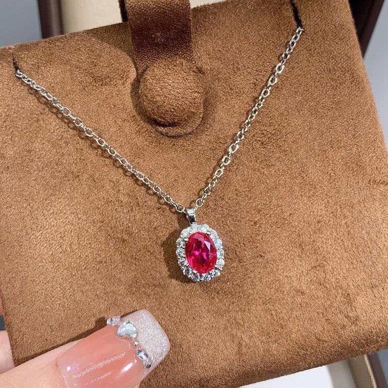 Elegant Skin-Brightening Red Corundum Jewelry Set: 1 Carat Pendant Necklace, Pigeon Blood Red Ring, and Earrings with Artificial Colored Gemstones.