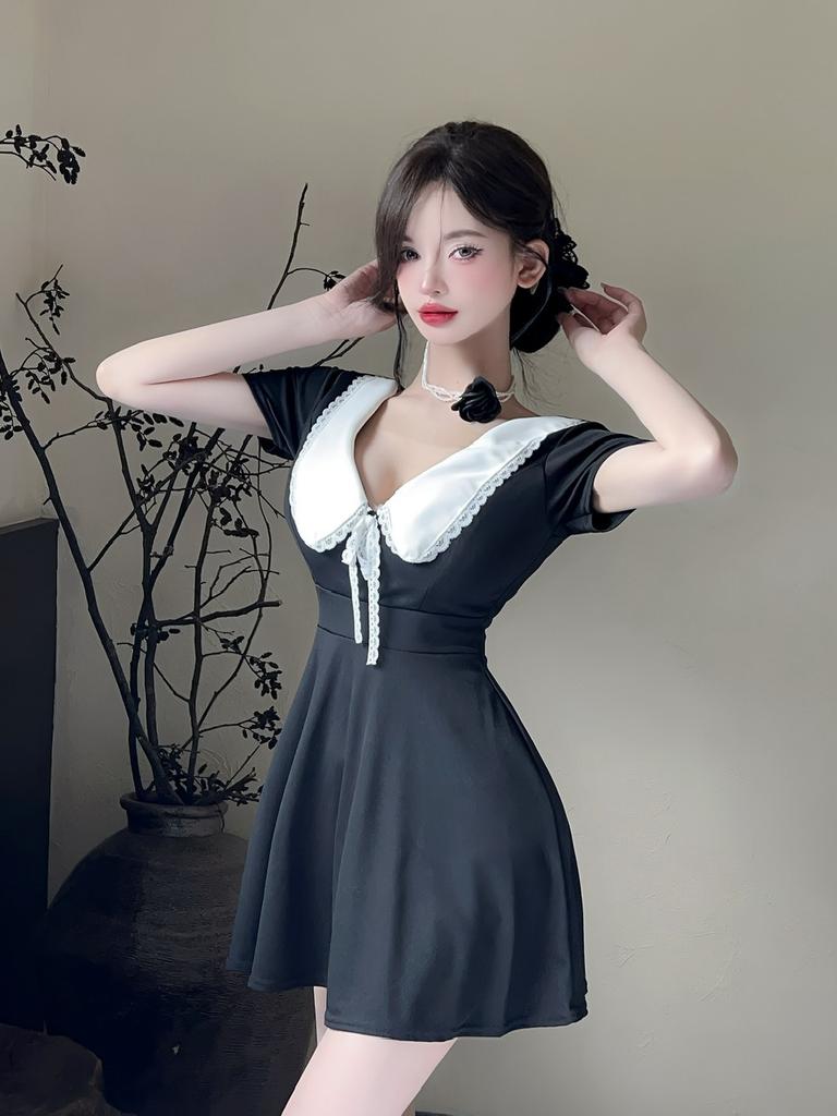 Sexy low-cut lapel dress, waist and thin, big swing a-word skirt, work clothes.