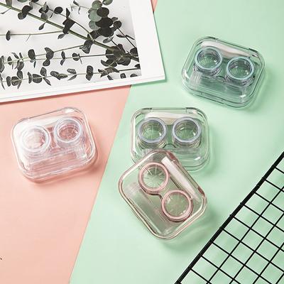 Recipientes e pinças para lentes de contacto