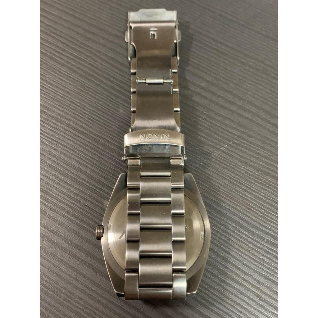 Used NIXON analog watch metallic black