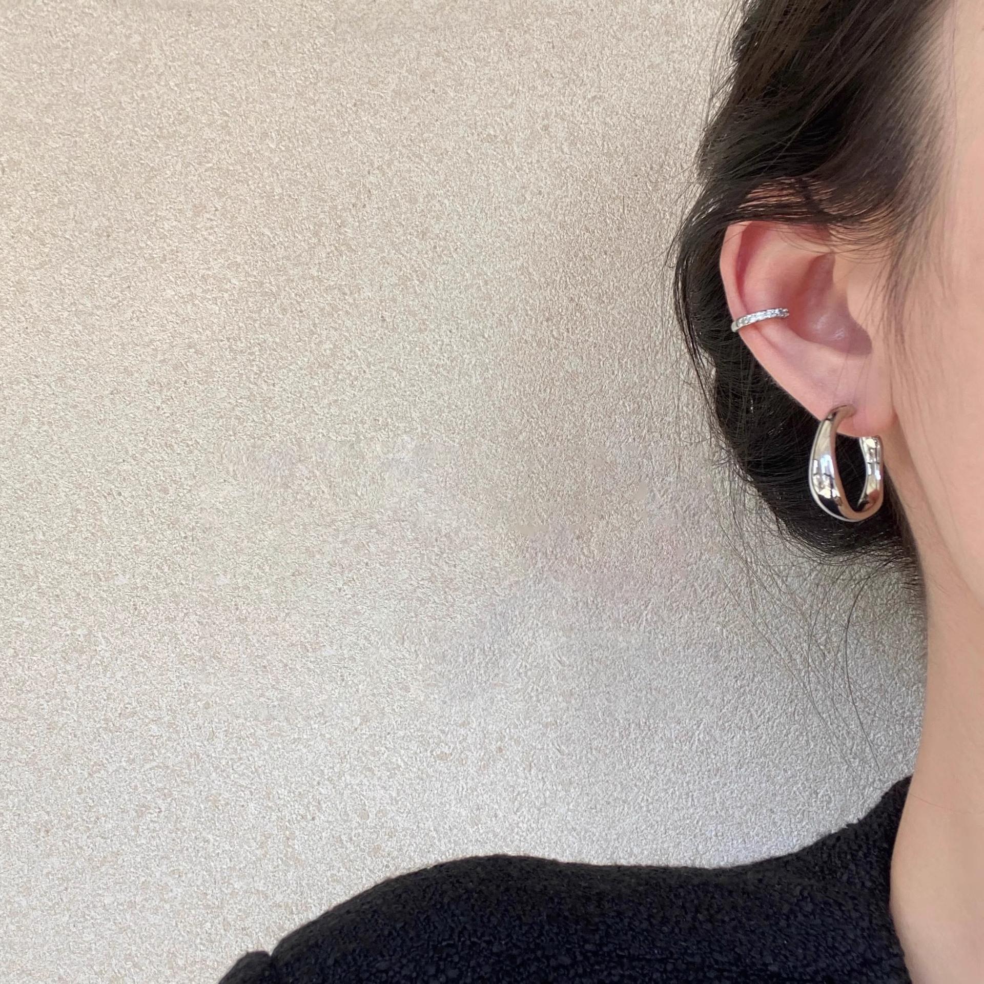 

Cold wind irregular plain ring earrings women s simple niche design sense metal stud earrings 925 silver needle earrings
