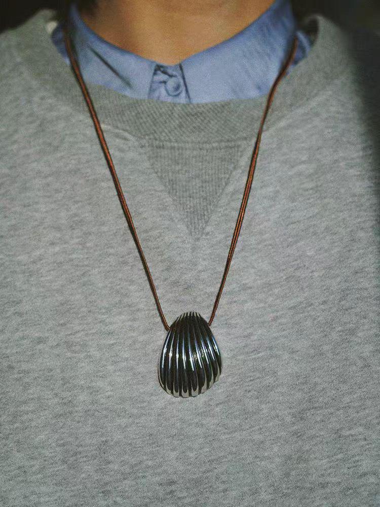 Elegant Silver Seashell Pendant Necklace with Brown Leather Cord