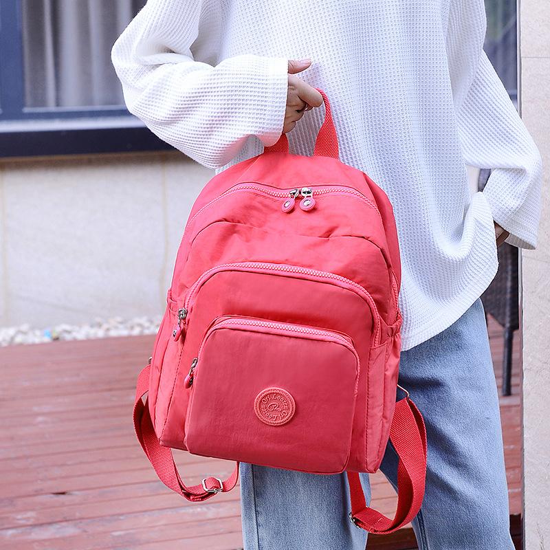 Middle-aged women's backpack new light casual nylon bag solid color multi-layer simple and fashionable small backpack