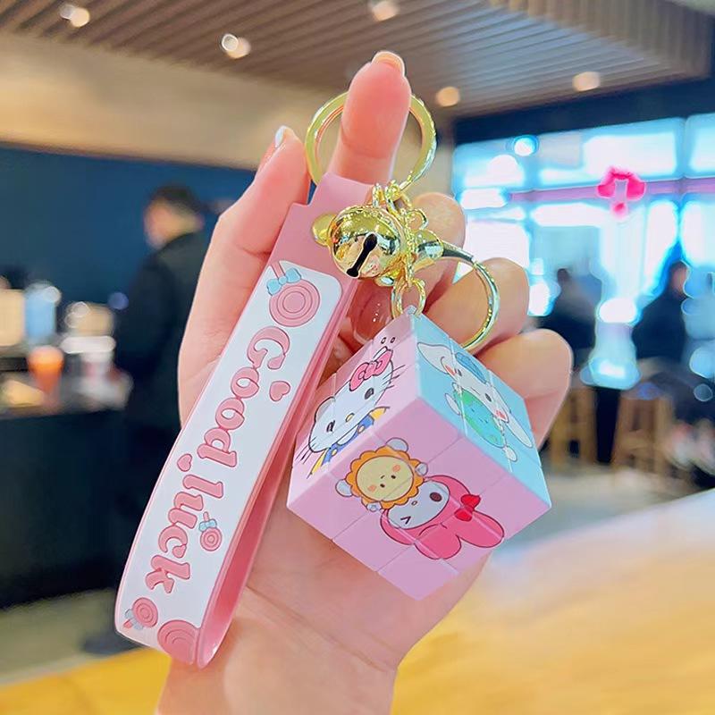 

2026 Sanrio Adorable Hello Kitty Melody Kuromi ,Animation Design Square Movable Key Ring With Bell, Practicality Pouch Pendant Key Ring Fun Plaything