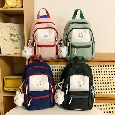 Style collège assortiment de couleurs petit modèle standard portable sac à dos étudiant école sac à dos grande capacité nouveau printemps