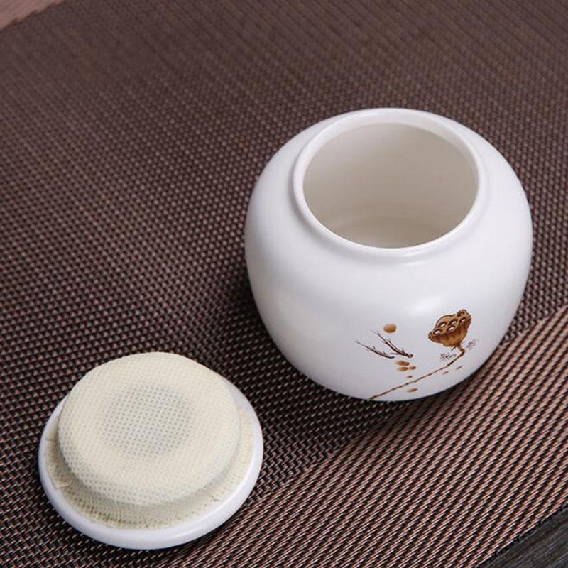 Porcelain White Color Chinese Style Lotus Pattern Sealed Storage Tea Jar Travel Easy to Carry Power Spice Tea Box Teaware
