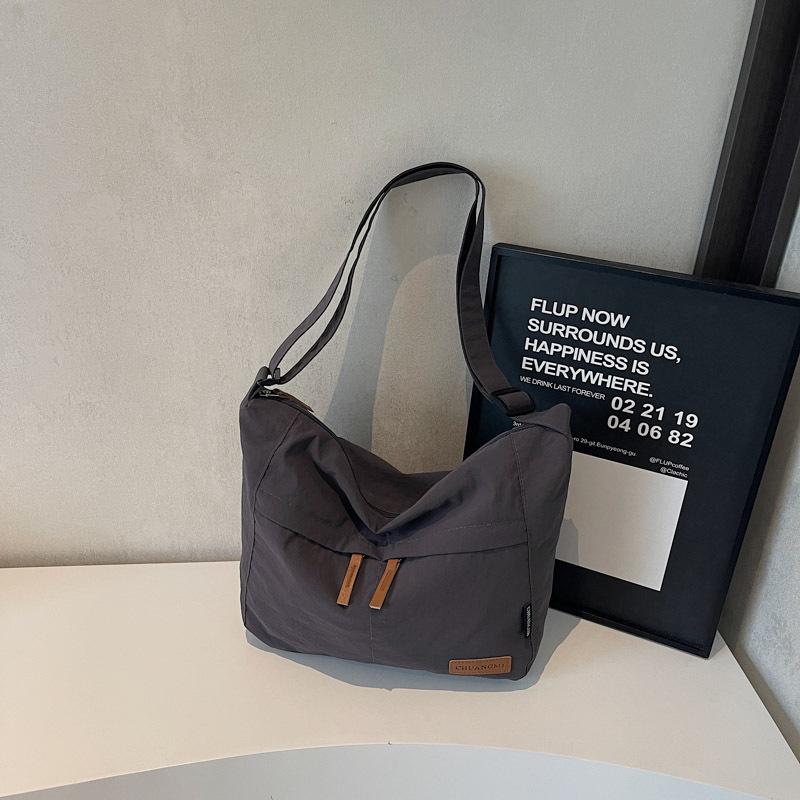 Canvas bag women's large-capacity new versatile shoulder messenger bag cloth bag class commuter tote bag