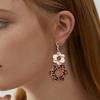 Retro Wood Earrings with Unique Hollow Flower and Cow Pattern Elegant Drop Ear Pendant for Stylish Ladies