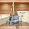 Small Niche Design Bucket Bag Women's New High-quality Temperament Hand-held Crossbody Women's Bag