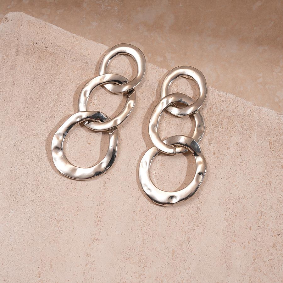 

Metal pleated geometric round silver needle earrings niche cold wind earrings