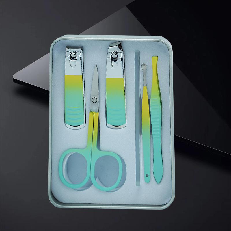 Nail Care Gift Set: Portable Tin Box with Clippers, Scissors, Tweezers, and Ear Spoon