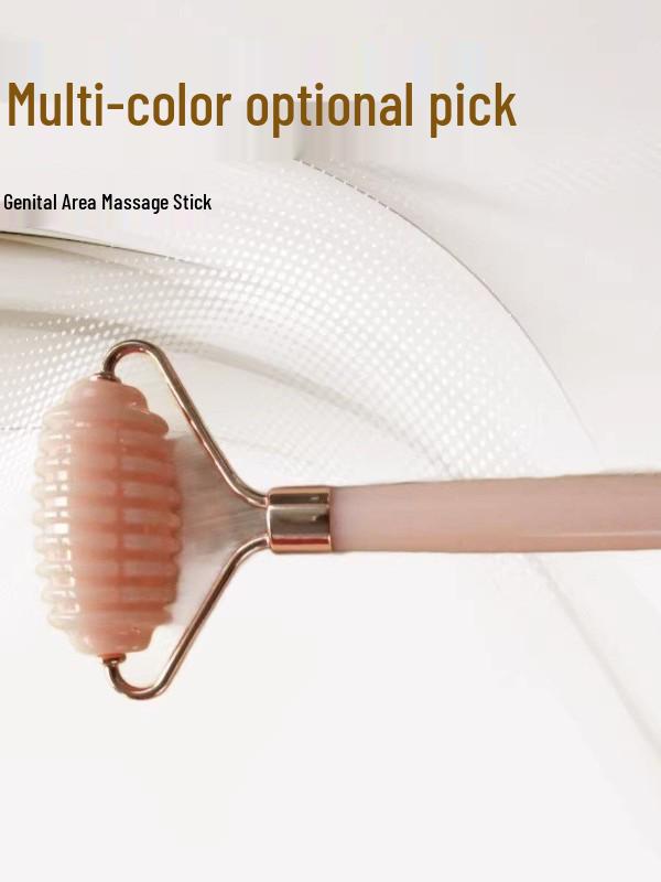 Heart-Shaped Rose Quartz Facial Roller & Gua Sha Massager for Skin Lifting and Muscle Relaxation.