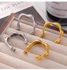 Elegant C-Shaped Stud Earrings, European/American Style, Irregular Design, Titanium Steel, Real Gold Plated, Cold & Sophisticated Appeal