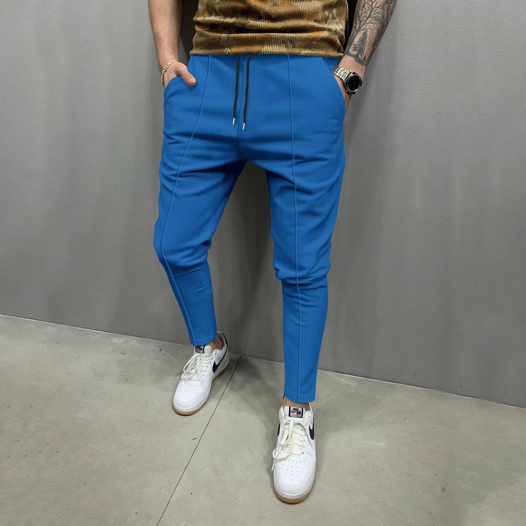 Four Seasons Men's New Solid Color Tethered Trousers Loose Casual Sports Elastic Waist Straight Pants