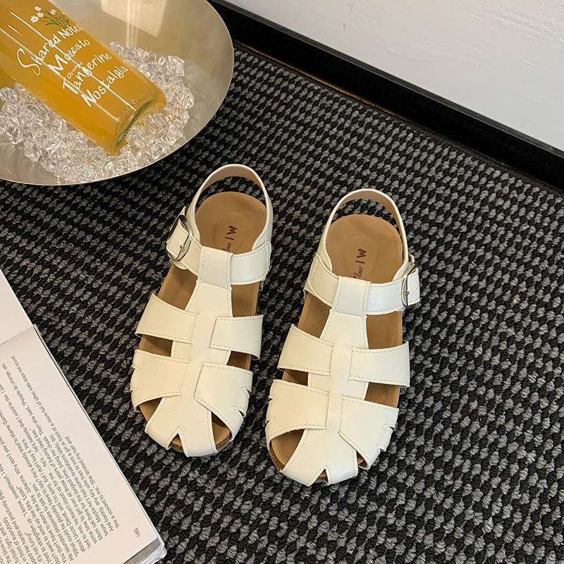 

Woven fairy wind hollow bag head skirt sandals women s summer with 2025 new flat-bottomed versatile casual pig cage shoes 40