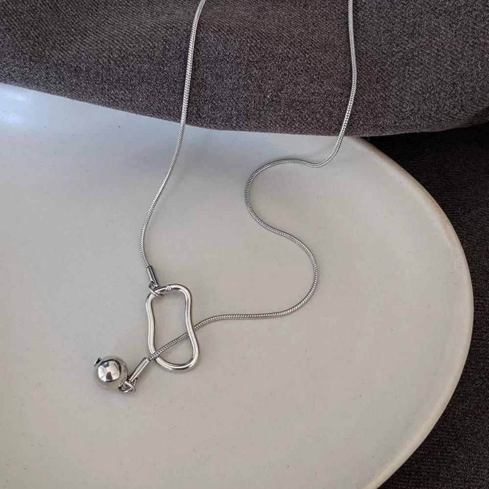 Hip hop style silver round bead necklace with simple and niche design, geometric hollow necklace