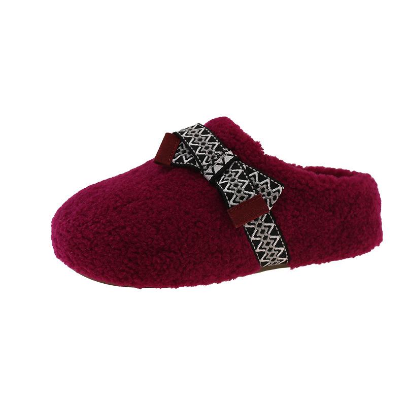 

Bow lamb wool slippers women wear autumn and winter fashion one pedal velvet warm bag head half drag flat bottom 40