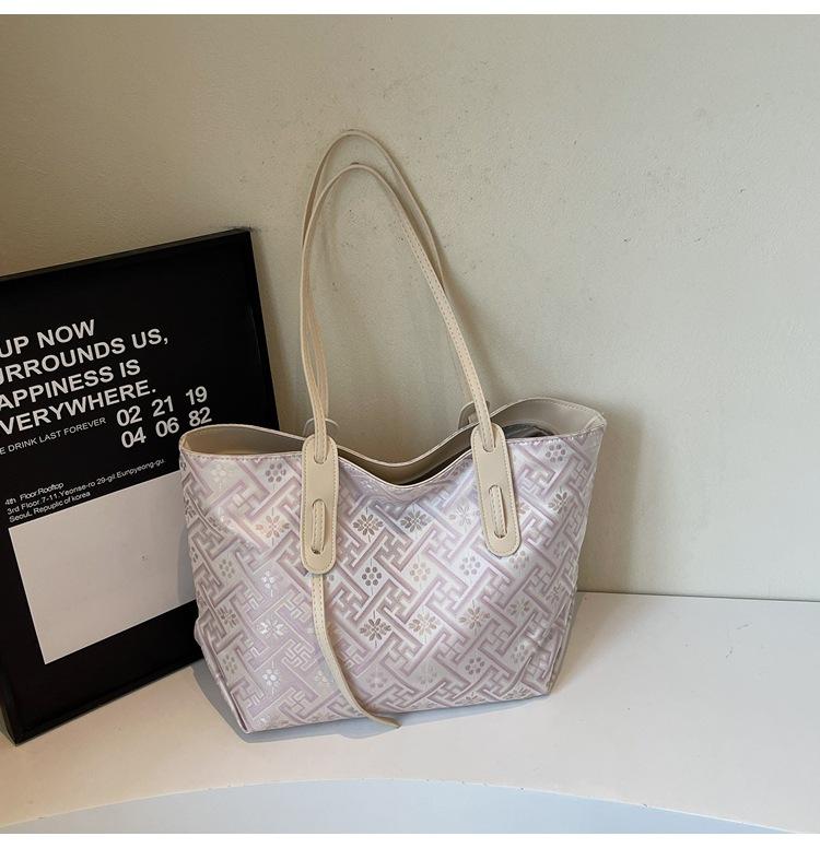 

Summer popular tote bag 2025 new fashion versatile niche design shoulder commuter handbag розовый