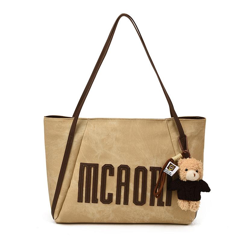 

Retro letter large capacity tote bag women s 2025 autumn and winter new fashion shoulder bag foreign commuter armpit bag no pendant