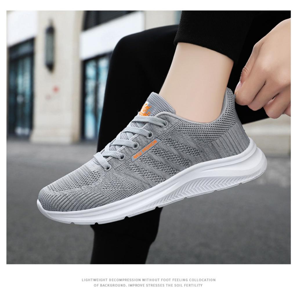 Spring New Simple Men's Shoes Pure Black Sports and Leisure Shoes Light and Breathable Couple Flying Woven Shoes