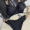 2025 Schwarzer Mode Bikini Neuer Sexy Badeanzug Frauen Große Goldkette Accessoire Träger Einfarbig Geteilter Badeanzug Strandparty Kleidung