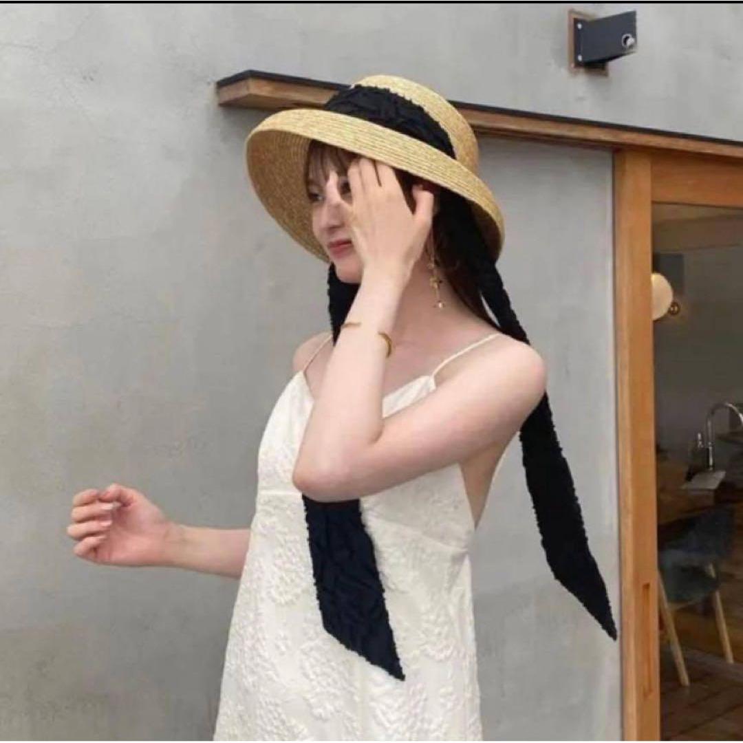 Used Straw hat Straw hat with black ribbon