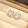 Light luxury and high-end rotatable four-leaf clover stud earrings S925 silver needle slightly inlaid with zirconium earrings Fashionable foreign styl