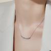 Curved smile pendant necklace, set with zircon stones