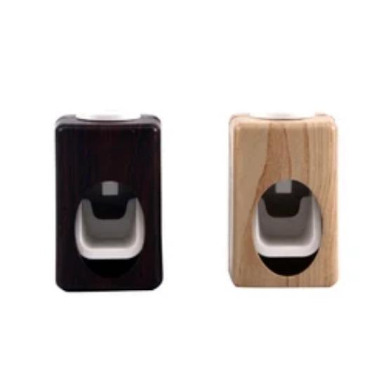 

Экономичный, но стильный дозатор зубной пасты с отделкой под дерево, автоматической функцией и встроенным держателем зубной щетки