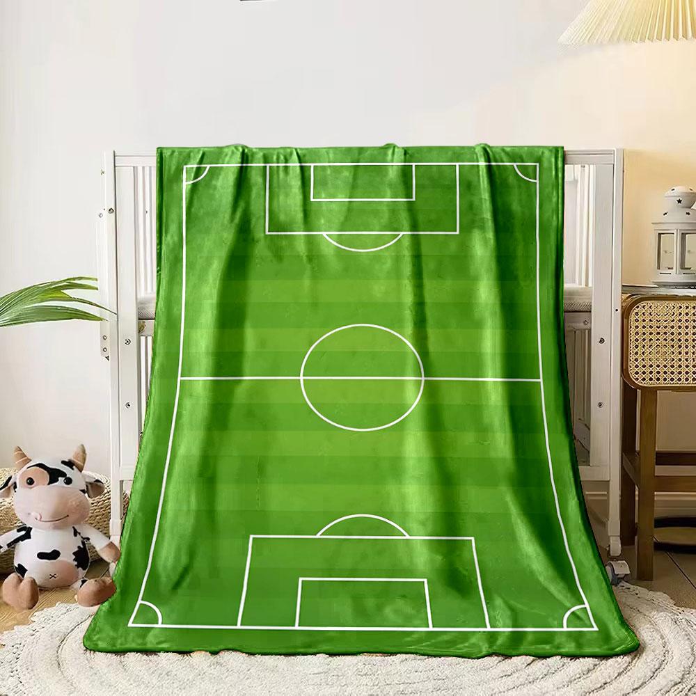 

A green soccer field with white boundary and marking lines. for all seasons blanket lunch break throw gift 80cm x 120cm