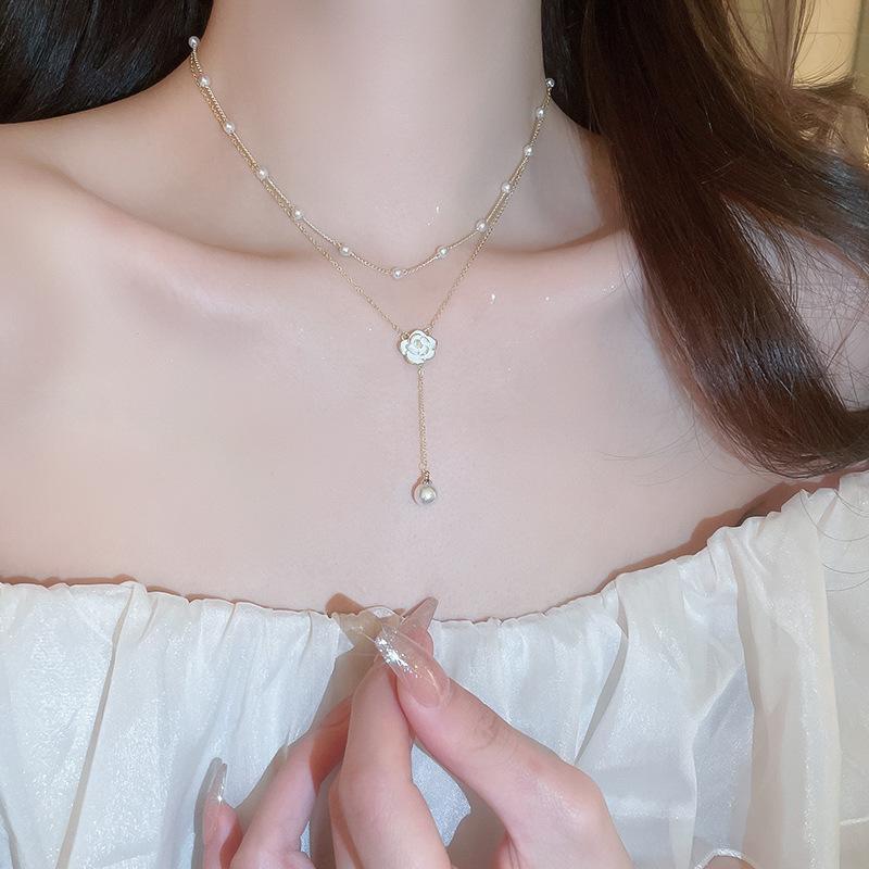 Simple long pearl necklace fashion ins design sense collarbone chain Y type personality temperament versatile item decoration