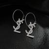 Fashion Geometric Bow Flower Pearl Earrings Women'S Premium Versatile Small Fragrant Wind Earrings