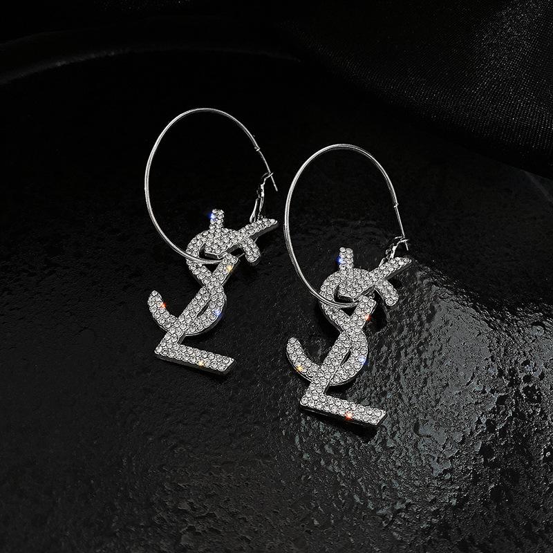 Fashion Geometric Bow Flower Pearl Earrings Women'S Premium Versatile Small Fragrant Wind Earrings