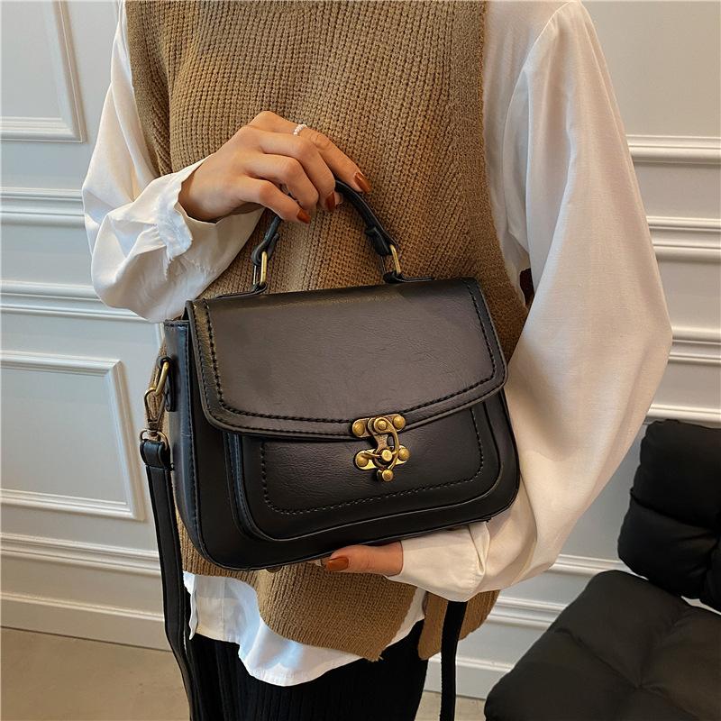 2025 new small square bag retro style portable bag retro lock popular women's bag simple small bag