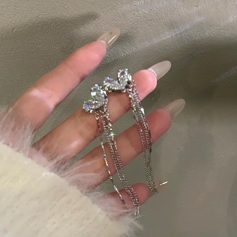 

Циркон серебро любовь кисточки клипсы для ушей модные изысканные серьги легкая роскошь высокое чувство новые серьги темперамент женщины