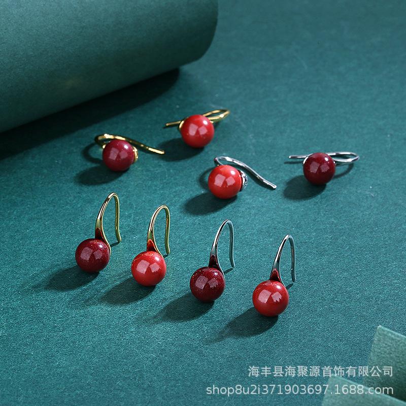 

Cinnabar Red Christmas Earrings: Korean Fashion Synthetic Purple Sand Bead Studs for Women Golden Imperial Sand Earrings
