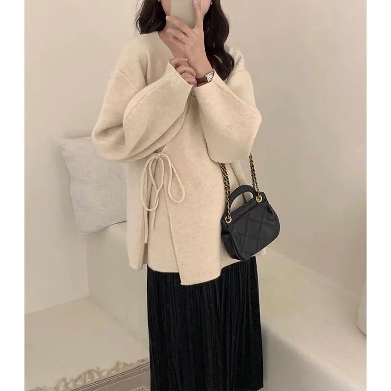 

2025 Asymmetrical Korean Knitted Cardigan: Cozy Autumn/Winter Sweater with Stylish Tie-Up Design S 85-95