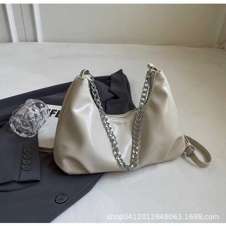 

Модная сумка-кроассан на мягком плече 2025 новый летний дизайн нишевая сумка-мессенджер на цепочке сумка через плечо для поездок на работу