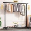 Floor Standing Clothes Rack and Coat Stand with Folding Single Pole for Bedroom or Dormitory.