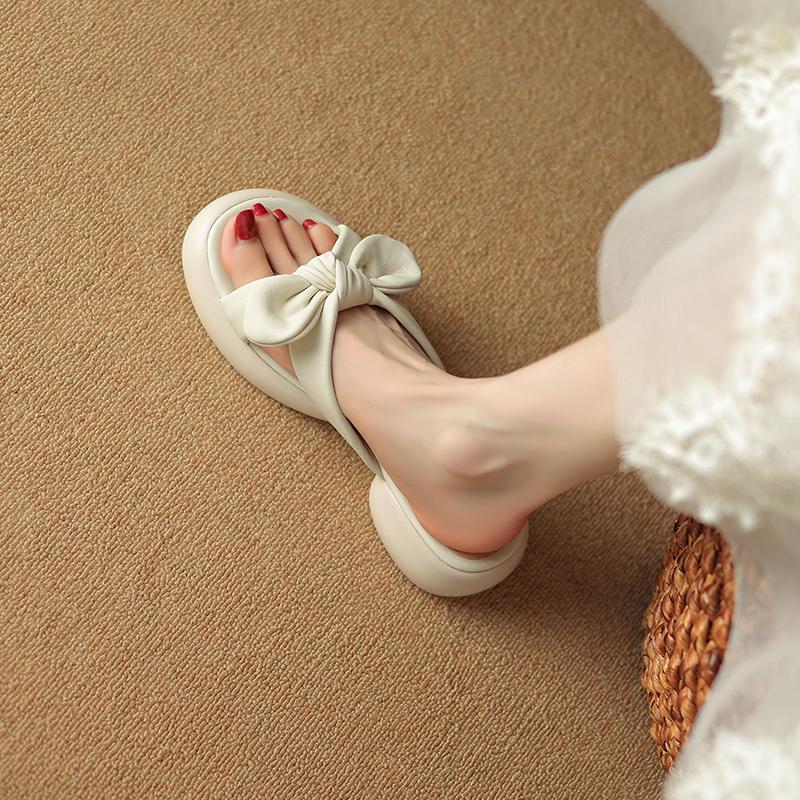 

Non-extravagant Feichi giant cute~ leather round head bow thick bottom open toe one-word drag women wear thick heel sandals 40