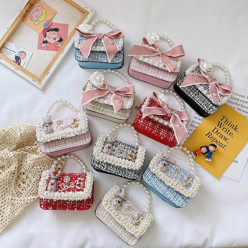 Stylish Mini Girls Handbag With Pearl Bow Design For Fashionable Princesses In Black And White Colors