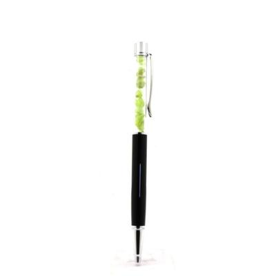 Stones and Minerals. Raw Peridot Mineral Pen Pakistan. Black Color.