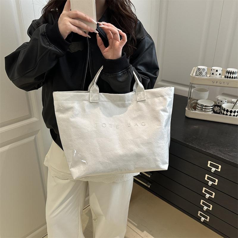 Large capacity DuPont paper jelly bag fashionable transparent pvc waterproof hand bag children kraft paper commuter hand