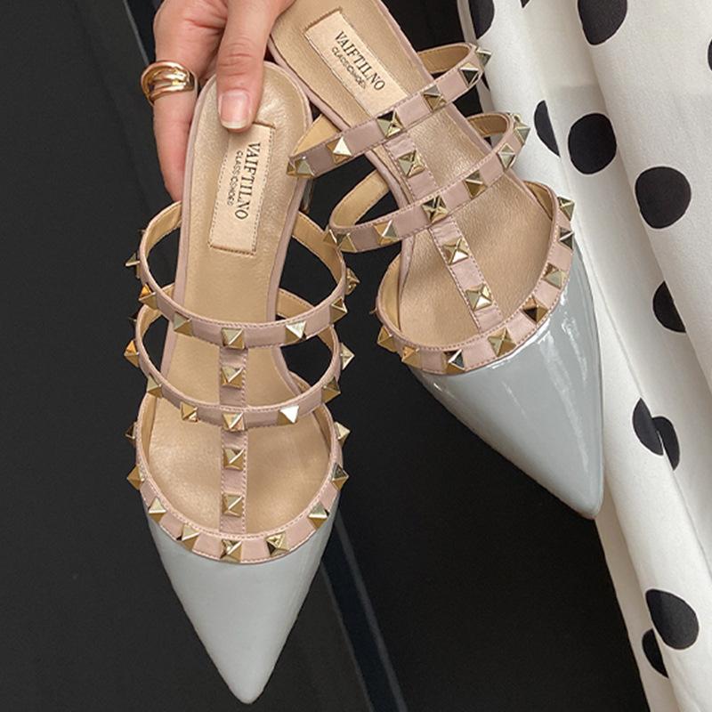 Spring and summer new rivets patent leather thick heel pointed head middle heel bag head lazy versatile half drag wear sandals women's shoes