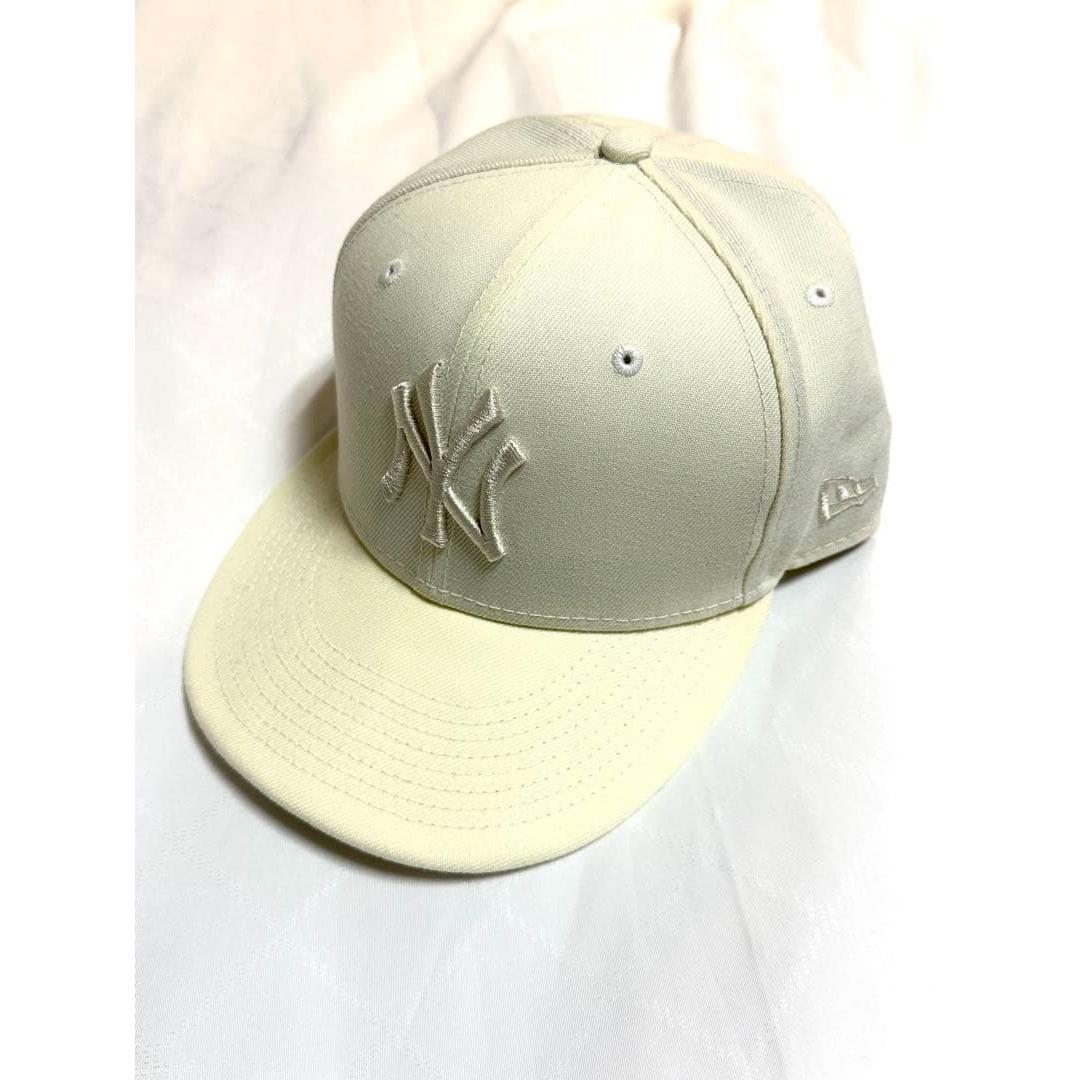 Used cream baseball cap
