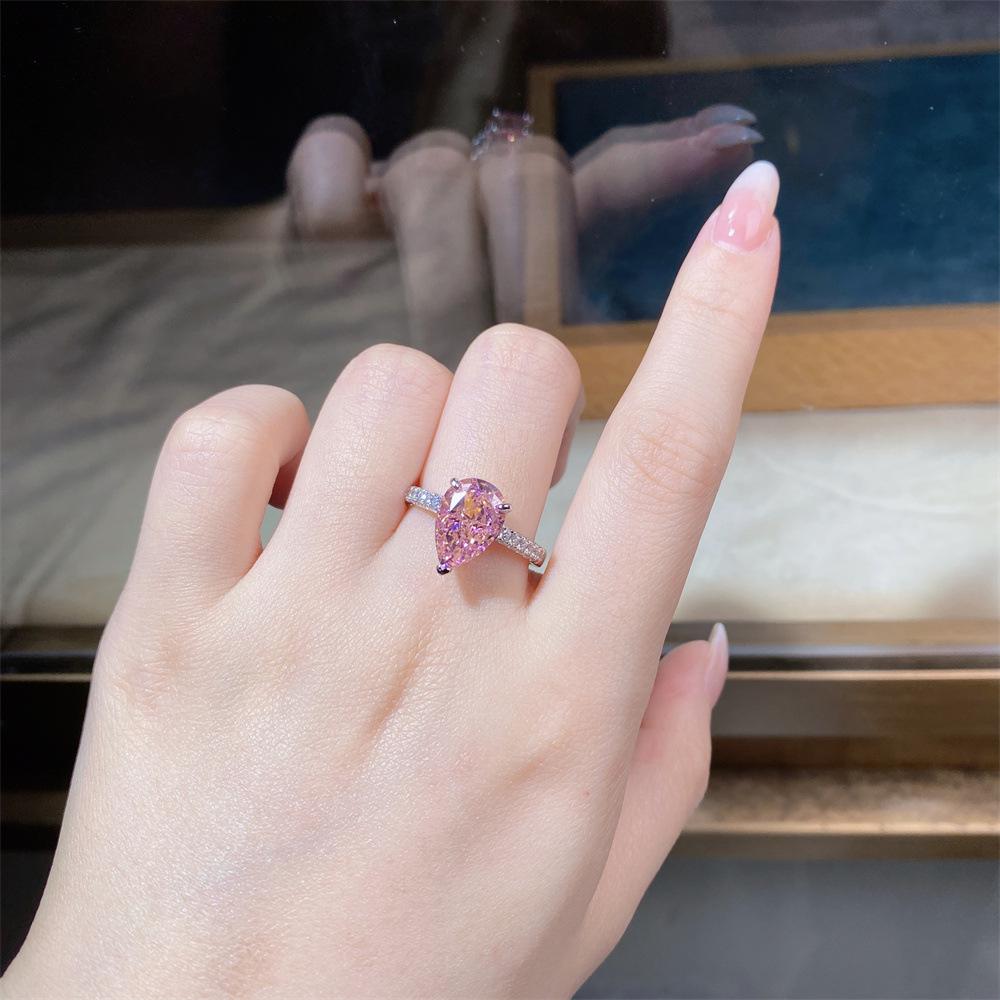 Nine Beauty Jewelry Teardrop Zircon Ring: S925 Sterling Silver, Pink High-Carbon Diamond, European & American Ice Flower Cut.