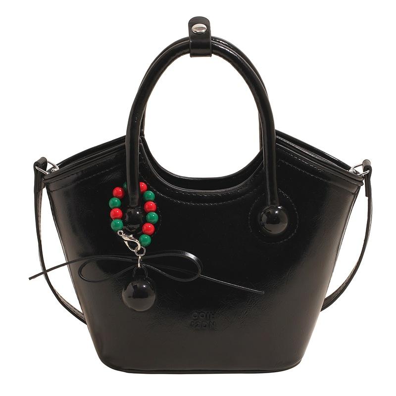 New niche retro simple premium texture portable bucket bag casual commuting versatile messenger women s bag