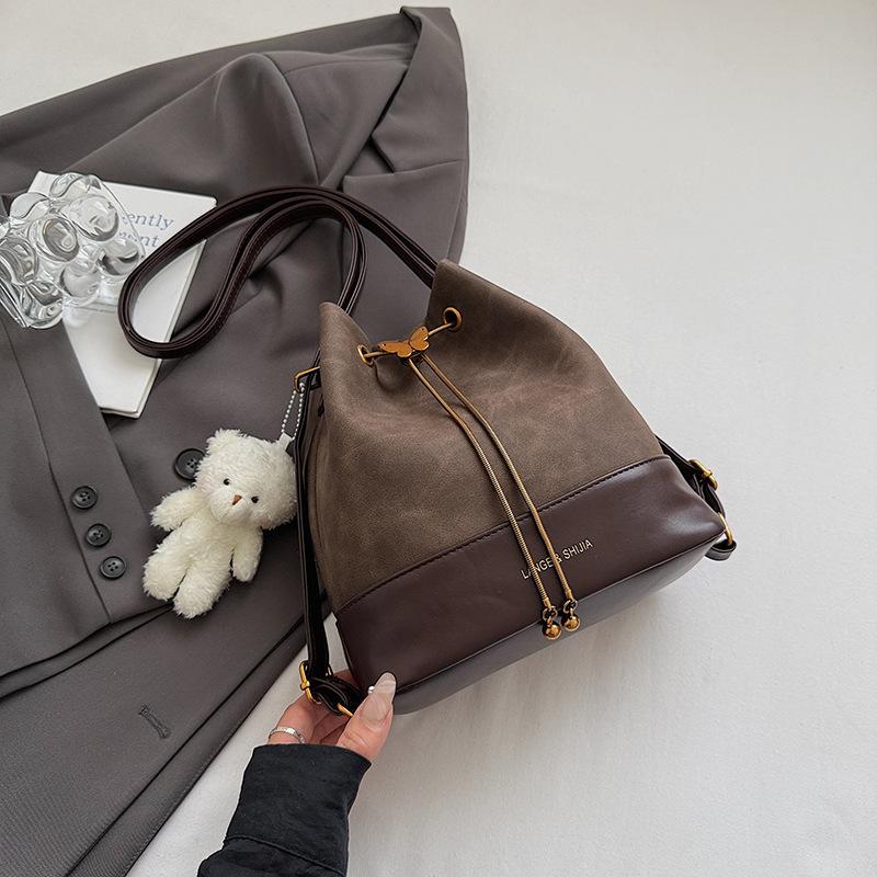 Bucket bag One shoulder messenger bag Women's autumn new niche women's bag Drawstring dual-purpose small backpack